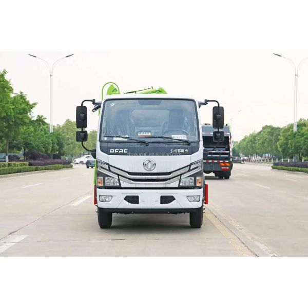 Self-loading garbage truck front view