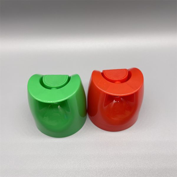 Aerosol spray cap mounted on can demonstrating ergonomic design